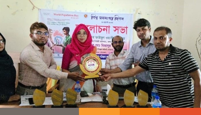 বি